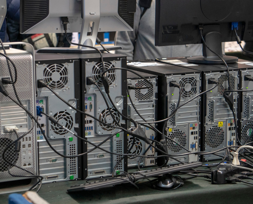 Old Computers Lined Up On Desk