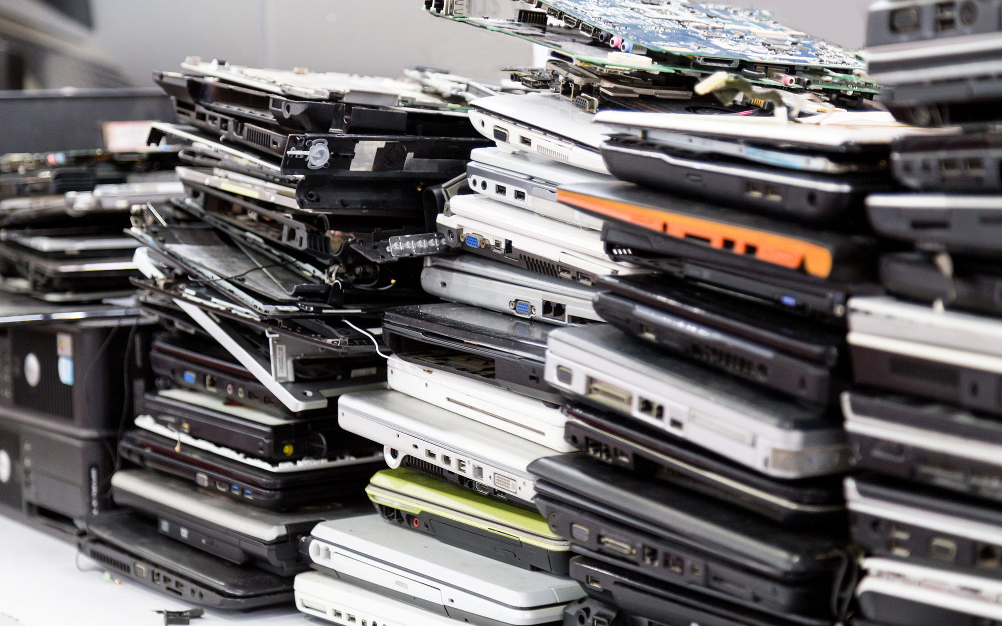 Stack Of Old, Broken And Obsolete Laptop Computer For Repair